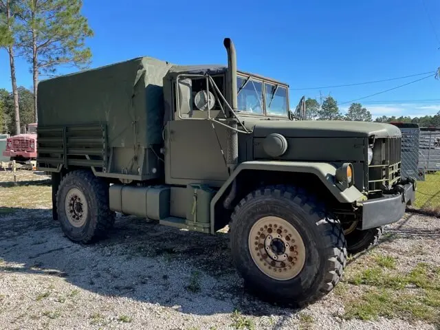 Six-wheel truck with a covered cargo bed