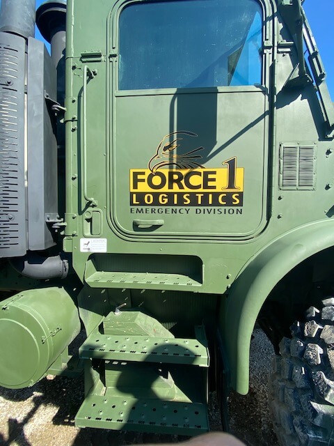 Force 1 Logistics Emergency Division decal on a truck door